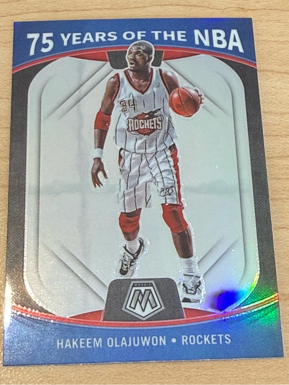 Panini 75 Years of the NBA Hakeem Olajuwon Rockets Blue Red White Trading Card